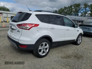 2014 Ford Escape SE с VIN 1FMCU0GX7EUA94118, выставлен на аукционе Copart как лот 55739735 с пробегом 139 208 миль миль и Списание • Salvage title. История ставок и продаж доступна на DreamBid. Изображение 3.