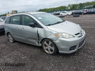 2007 Mazda 5 Touring z VIN JM1CR29L570158291, wystawiony jako IAAI lot #42267447 z przebiegiem Nie podano mil oraz . Historia ofert i sprzedaży dostępna na DreamBid. Obrazek 1.