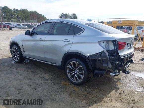 2019 BMW X6 xDrive35i z VIN 5UXKU2C52K0Z63984, wystawiony jako IAAI lot #41612265 z przebiegiem 65 634 mil mil oraz . Historia ofert i sprzedaży dostępna na DreamBid. Obrazek 3.