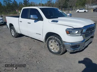 2020 Ram 1500 Laramie with VIN 1C6SRFDT8LN281291, listed as a IAAI auction lot 41728331 with Not provided miles and . Bid and sale history available at DreamBid. Image 1.
