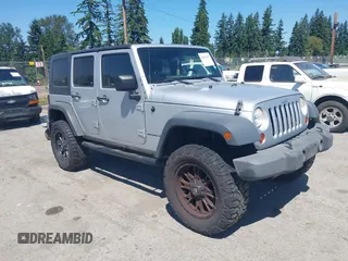 2008 Jeep Wrangler Unlimited X z VIN 1J4GA39148L596727, wystawiony jako IAAI lot #42632457 z przebiegiem 175 000 mil mil oraz . Historia ofert i sprzedaży dostępna na DreamBid. Obrazek 1.