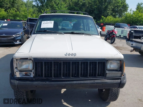 1996 Jeep Cherokee Sport z VIN 1J4FJ68S3TL226188, wystawiony jako IAAI lot #42460538 z przebiegiem 217 118 mil mil oraz . Historia ofert i sprzedaży dostępna na DreamBid. Obrazek 12.
