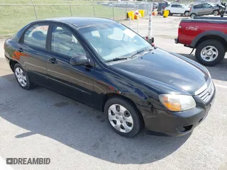 2009 Kia Spectra EX with VIN KNAFE221495631702, listed as a IAAI auction lot 41875896 with 234,550 mi miles. Bid and sale history available at carsss.com. Image 1.