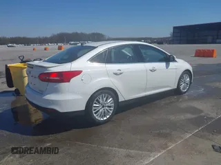 2016 Ford Focus Titanium с VIN 1FADP3J27GL359200, выставлен на аукционе IAAI как лот 42005989 с пробегом 135 589 миль миль и . История ставок и продаж доступна на DreamBid. Изображение 4.