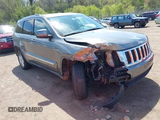 2011 Jeep Grand Cherokee Laredo z VIN 1J4RR4GGXBC587911, wystawiony jako IAAI lot #42156885 z przebiegiem 178 999 mil mil oraz . Historia ofert i sprzedaży dostępna na DreamBid. Obrazek 1.