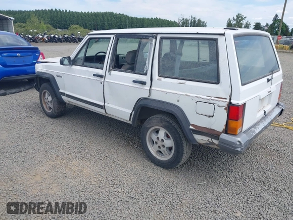 1993 Jeep Cherokee z VIN 1J4FT28PXPL560996, wystawiony jako IAAI lot #42526590 z przebiegiem 304 201 mil mil oraz . Historia ofert i sprzedaży dostępna na DreamBid. Obrazek 3.
