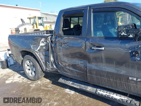 2019 Ram 1500 Laramie with VIN 1C6SRFDTXKN860913, listed as a IAAI auction lot 41356687 with 199,485 mi miles. Bid and sale history available at carsss.com. Image 6.