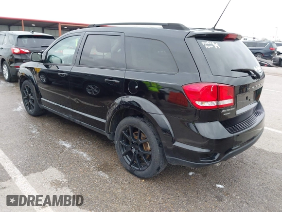 2013 Dodge Journey SXT with VIN 3C4PDDBG4DT660474, listed as a IAAI auction lot 41984607 with 124,926 mi miles and . Bid and sale history available at DreamBid. Image 3.