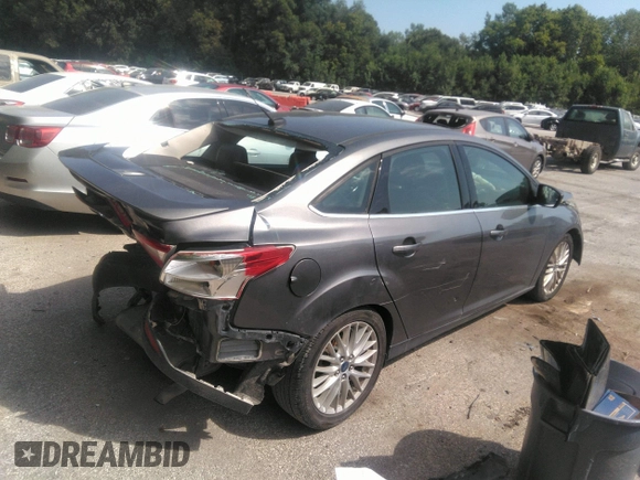 2014 Ford Focus Titanium with VIN 1FADP3J20EL236805, listed as a IAAI auction lot 41708437 with 105,724 mi miles. Bid and sale history available at carsss.com. Image 4.
