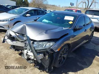2019 Honda Civic Sport with VIN 19XFC2F82KE019704, listed as a IAAI auction lot 41770051 with 90,011 mi miles and . Bid and sale history available at DreamBid. Image 17.