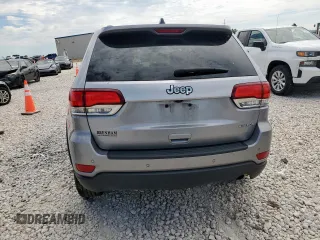 2021 Jeep Grand Cherokee Laredo X z VIN 1C4RJEAG2MC681229, wystawiony jako Copart lot #57771765 z przebiegiem 110 671 mil mil oraz Szkoda całkowita • Salvage title. Historia ofert i sprzedaży dostępna na DreamBid. Obrazek 6.
