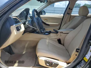 2013 BMW 3 Series 320i xDrive with VIN WBA3C3C54DF981575, listed as a Copart auction lot 65572755 with 130,468 mi miles and Clean title. Bid and sale history available at DreamBid. Image 7.