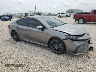 2025 Toyota Camry LE with VIN 4T1DAACKXSU563016, listed as a Copart auction lot 50403945 with 1,689 mi miles and Salvage Title. Bid and sale history available at carsss.com. Image 4.