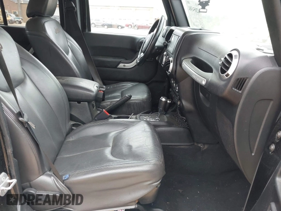 2015 Jeep Wrangler Unlimited Rubicon with VIN 1C4BJWFG7FL688728, listed as a IAAI auction lot 42054304 with 100,152 mi miles and . Bid and sale history available at DreamBid. Image 5.