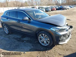 2022 BMW X2 xDrive28i with VIN WBXYJ1C05N5U40472, listed as a IAAI auction lot 41433452 with 67,801 mi miles. Bid and sale history available at carsss.com. Image 1.