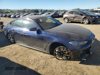 2024 BMW i4 eDrive40 with VIN WBY73AW03RFS35715, listed as a Copart auction lot 87730595 with 10,811 mi miles and Salvage Title. Bid and sale history available at carsss.com. Image 4.