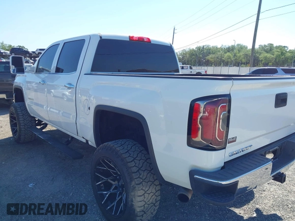 2017 GMC Sierra 1500 SLT z VIN 3GTU2NEC2HG474079, wystawiony jako IAAI lot #41899673 z przebiegiem 104 033 mil mil oraz . Historia ofert i sprzedaży dostępna na DreamBid. Obrazek 3.