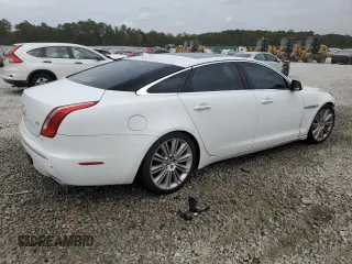 2013 Jaguar XJ with VIN SAJWA2GB8DLV52975, listed as a Copart auction lot 79123644 with 160,473 mi miles and Salvage Title. Bid and sale history available at carsss.com. Image 3.