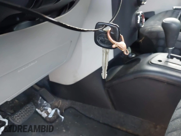 2013 Scion iQ with VIN JTNJJXB07DJ022337, listed as a IAAI auction lot 41507619 with Not provided miles and . Bid and sale history available at DreamBid. Image 11.