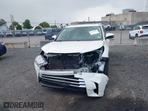 2019 Toyota Highlander SE with VIN 5TDJZRFH1KS567376, listed as a IAAI auction lot 42728105 with 58,970 mi miles and . Bid and sale history available at DreamBid. Image 12.