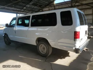 2013 Ford Econoline Wagon XL with VIN 1FBSS3BL0DDA77076, listed as a Copart auction lot 70474004 with 154,679 mi miles and Salvage Title. Bid and sale history available at carsss.com. Image 2.