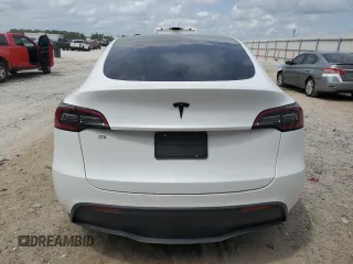 2021 Tesla Model Y Long Range with VIN 5YJYGDEE5MF203130, listed as a Copart auction lot 54642795 with 73,663 mi miles and Non Repairable. Bid and sale history available at DreamBid. Image 6.