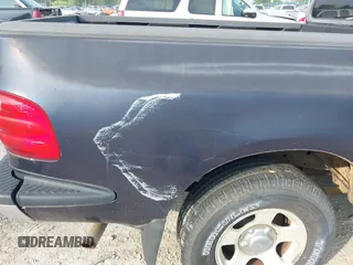 2000 Ford F-150 XL с VIN 2FTZX0722YCA70985, выставлен на аукционе IAAI как лот 42476412 с пробегом 171 033 миль миль и . История ставок и продаж доступна на DreamBid. Изображение 6.