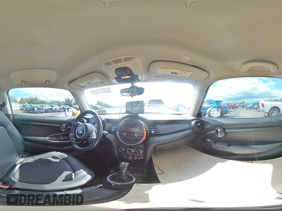 2016 MINI Hardtop with VIN WMWXP5C57G3B14701, listed as a Copart auction lot 58351545 with 111,647 mi miles and Salvage title. Bid and sale history available at DreamBid. Image 14.