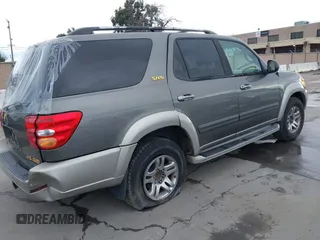 2003 Toyota Sequoia SR5 with VIN 5TDBT44A23S158061, listed as a IAAI auction lot 41807142 with 247,472 mi miles and . Bid and sale history available at DreamBid. Image 4.