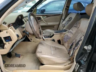 2000 Mercedes-Benz E-Class with VIN WDBJF70J1YB019224, listed as a Copart auction lot 77997574 with 0 mi miles and Non Repairable. Bid and sale history available at carsss.com. Image 7.