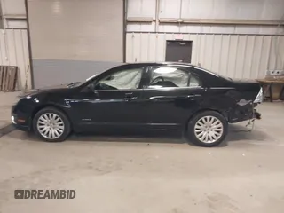 2010 Ford Fusion Hybrid with VIN 3FADP0L39AR140087, listed as a IAAI auction lot 41737705 with 118,563 mi miles. Bid and sale history available at carsss.com. Image 14.