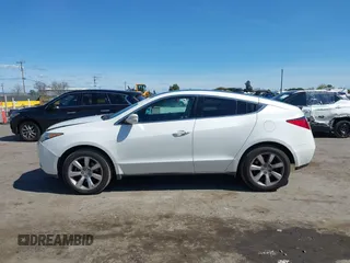 2012 Acura ZDX Tech Pkg with VIN 2HNYB1H42CH500312, listed as a IAAI auction lot 41841597 with 166,879 mi miles. Bid and sale history available at carsss.com. Image 15.
