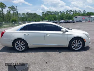2013 Cadillac XTS Luxury with VIN 2G61P5S38D9160016, listed as a IAAI auction lot 42192602 with 134,879 mi miles and . Bid and sale history available at DreamBid. Image 13.