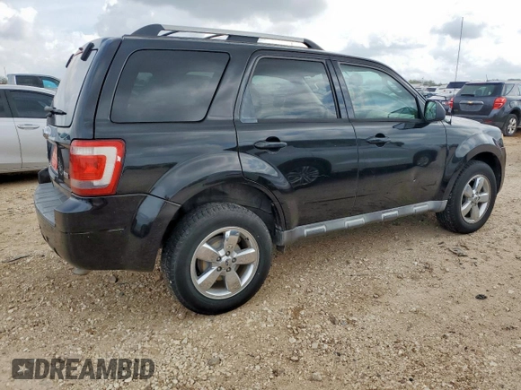 2011 Ford Escape Limited с VIN 1FMCU0EG1BKC04154, выставлен на аукционе Copart как лот 63944145 с пробегом 157 709 миль миль и Списание • Salvage title. История ставок и продаж доступна на DreamBid. Изображение 3.
