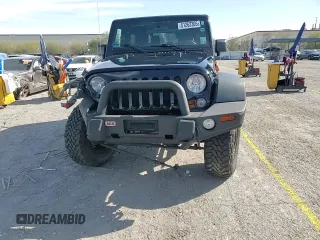 2017 Jeep Wrangler Sport with VIN 1C4AJWAGXHL715362, listed as a Copart auction lot 51262305 with 62,297 mi miles and Salvage Title. Bid and sale history available at DreamBid. Image 14.