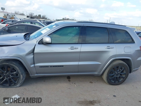 2020 Jeep Grand Cherokee Altitude with VIN 1C4RJEAGXLC403693, listed as a IAAI auction lot 41482425 with 67,161 mi miles and . Bid and sale history available at DreamBid. Image 14.