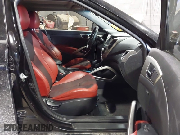 2012 Hyundai Veloster w/Black Int z VIN KMHTC6AD7CU080950, wystawiony jako IAAI lot #41606241 z przebiegiem 86 843 mil mil oraz . Historia ofert i sprzedaży dostępna na DreamBid. Obrazek 5.