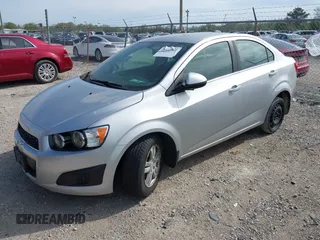2015 Chevrolet Sonic LT with VIN 1G1JC5SH6F4121976, listed as a IAAI auction lot 42143052 with 63,885 mi miles and . Bid and sale history available at DreamBid. Image 2.