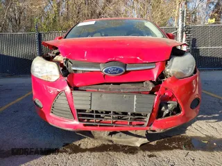 2013 Ford Focus SE z VIN 1FADP3F22DL311706, wystawiony jako IAAI lot #40888412 z przebiegiem 136 876 mil mil oraz . Historia ofert i sprzedaży dostępna na DreamBid. Obrazek 6.