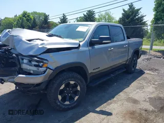 2019 Ram 1500 Rebel with VIN 1C6SRFLT8KN797618, listed as a IAAI auction lot 42556663 with 92,606 mi miles and . Bid and sale history available at DreamBid. Image 2.