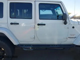 2012 Jeep Wrangler Unlimited Sahara with VIN 1C4BJWEG2CL117080, listed as a IAAI auction lot 41868590 with 92,475 mi miles. Bid and sale history available at carsss.com. Image 13.