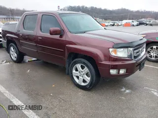 2009 Honda Ridgeline RTL with VIN 5FPYK16529B100032, listed as a IAAI auction lot 41206781 with 130,694 mi miles and . Bid and sale history available at DreamBid. Image 1.