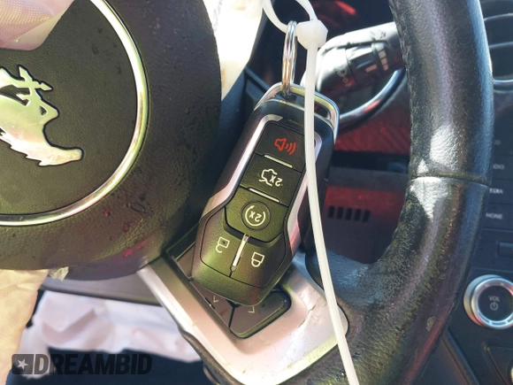 2016 Ford Mustang V6 z VIN 1FA6P8AM5G5226866, wystawiony jako IAAI lot #41306547 z przebiegiem Nie podano mil oraz . Historia ofert i sprzedaży dostępna na DreamBid. Obrazek 11.