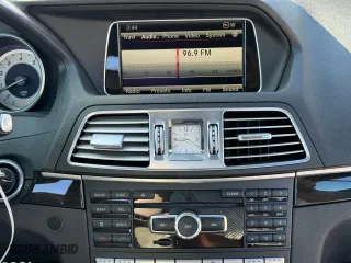 2015 Mercedes-Benz E-Class E 400 with VIN WDDKJ6FB2FF307294, listed as a Copart auction lot 77882794 with 82,173 mi miles and Salvage Title. Bid and sale history available at carsss.com. Image 9.
