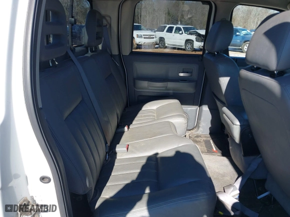 2005 Dodge Dakota Laramie with VIN 1D7HE58N35S138912, listed as a IAAI auction lot 41359470 with 263,136 mi miles. Bid and sale history available at carsss.com. Image 8.