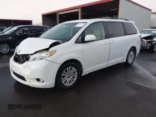 2014 Toyota Sienna XLE with VIN 5TDYK3DC1ES429932, listed as a IAAI auction lot 41692134 with 93,625 mi miles. Bid and sale history available at carsss.com. Image 18.