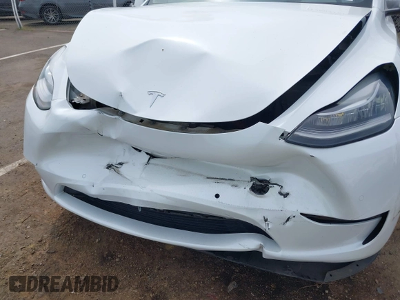 2022 Tesla Model Y Long Range with VIN 7SAYGDEE2NF403354, listed as a IAAI auction lot 41986216 with 53,177 mi miles and . Bid and sale history available at DreamBid. Image 6.