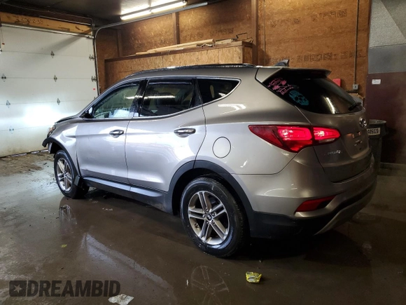 2017 Hyundai Santa Fe 2.4L z VIN 5XYZUDLBXHG415400, wystawiony jako Copart lot #58330205 z przebiegiem 116 196 mil mil oraz Szkoda całkowita • Salvage title. Historia ofert i sprzedaży dostępna na DreamBid. Obrazek 2.