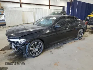 2018 BMW 5 Series 530i z VIN WBAJA5C5XJWA56936, wystawiony jako Copart lot #52367135 z przebiegiem 115 713 mil mil oraz Szkody całkowita. Historia ofert i sprzedaży dostępna na DreamBid. Obrazek 1.