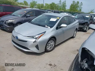 2016 Toyota Prius Two z VIN JTDKBRFU7G3002502, wystawiony jako IAAI lot #42241469 z przebiegiem 120 049 mil mil oraz . Historia ofert i sprzedaży dostępna na DreamBid. Obrazek 2.
